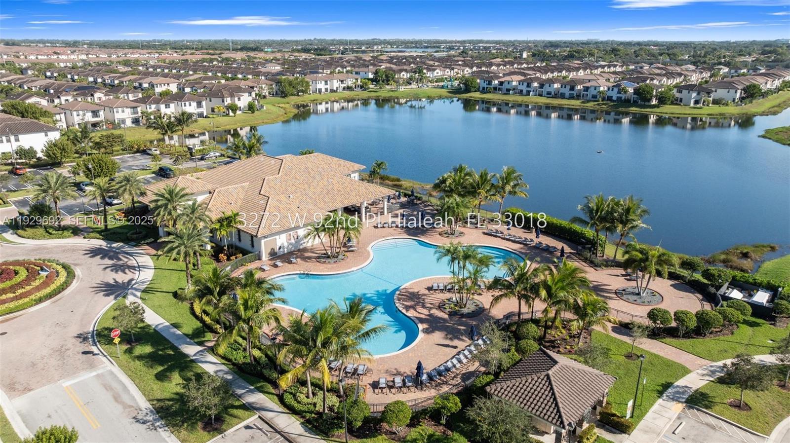 3272 West 92nd Place Hialeah, FL 33018 - Photo 35 of 37 an aerial view of lake and residential houses with outdoor space