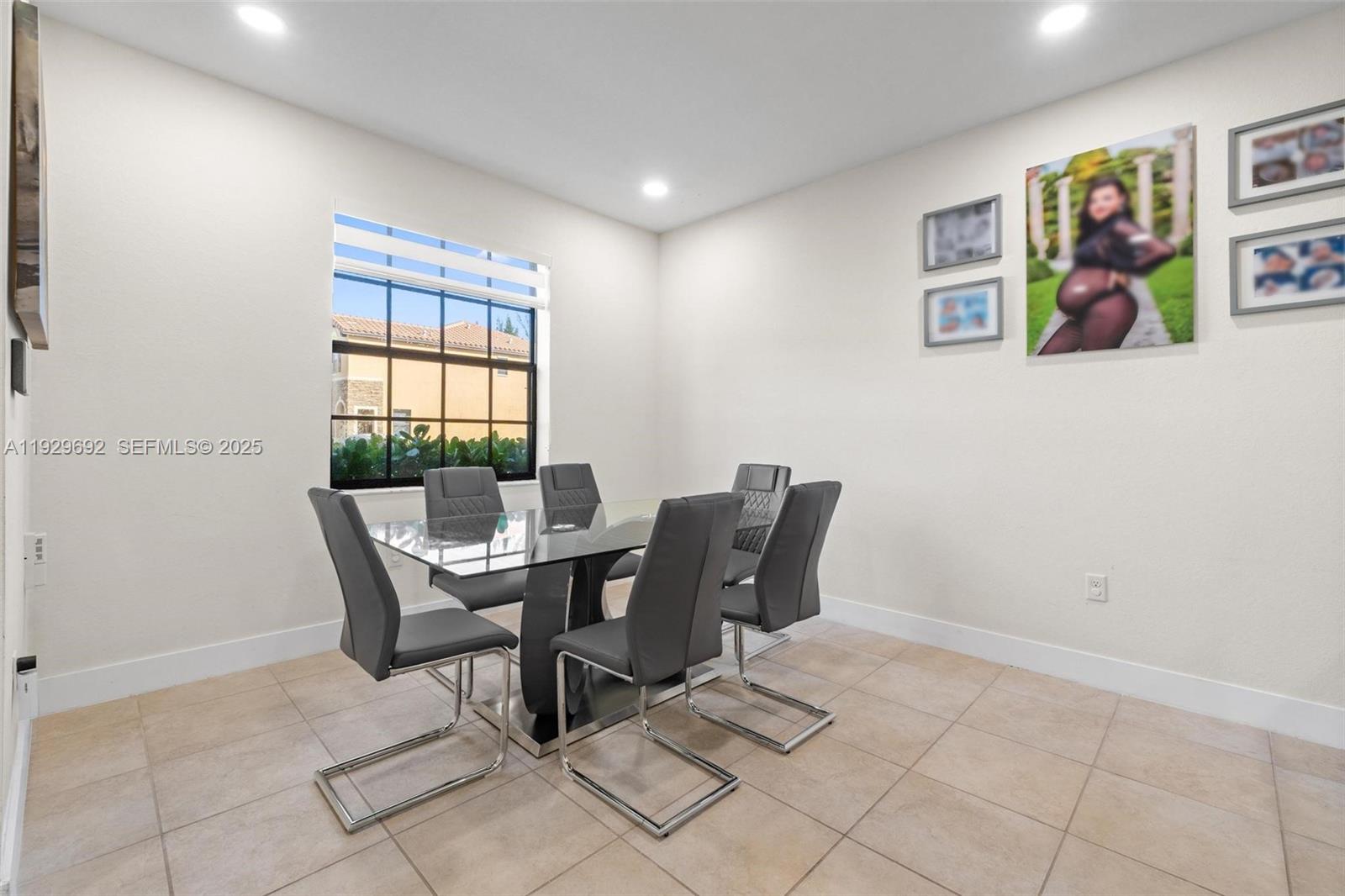 3272 West 92nd Place Hialeah, FL 33018 - Photo 5 of 37 a workspace with furniture and window