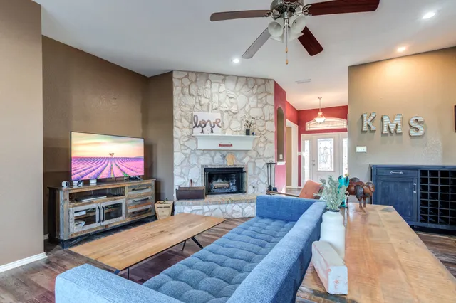 a workspace with furniture window and wooden floor