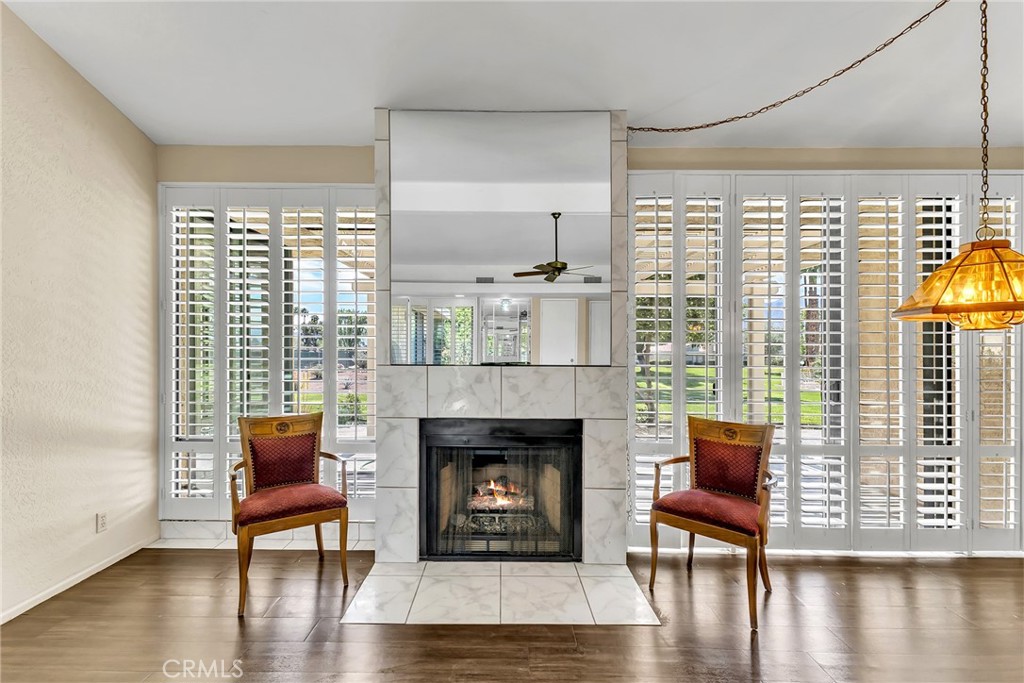 72355 Roxbury Drive Rancho Mirage, CA 92270 - Photo 18 of 61 a living room with furniture and a fireplace