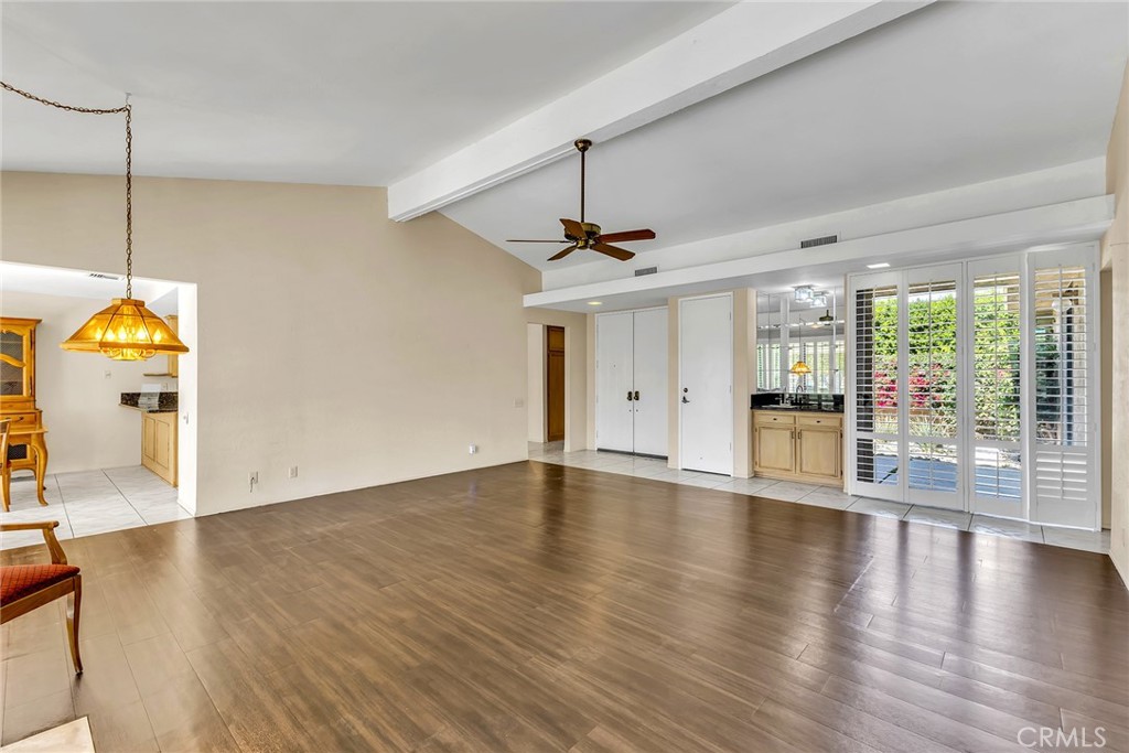 72355 Roxbury Drive Rancho Mirage, CA 92270 - Photo 19 of 61 a view of an empty room with window and wooden floor