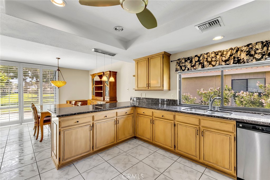 72355 Roxbury Drive Rancho Mirage, CA 92270 - Photo 30 of 61 a kitchen with sink and cabinets
