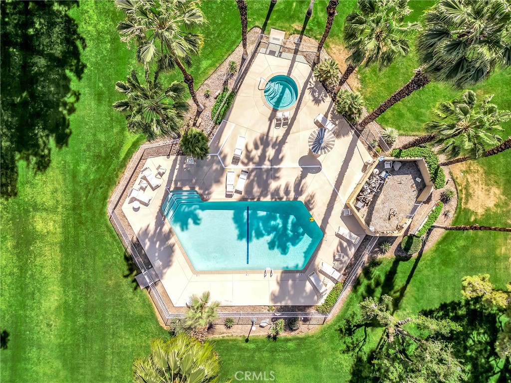 72355 Roxbury Drive Rancho Mirage, CA 92270 - Photo 3 of 61 a view of a swimming pool with a yard