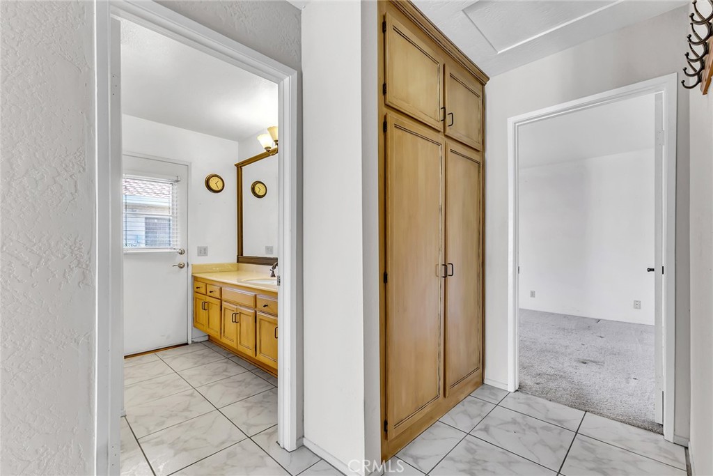 72355 Roxbury Drive Rancho Mirage, CA 92270 - Photo 33 of 61 a view of a bathroom with tub shower and sink