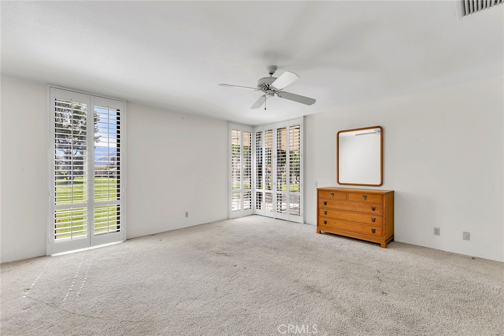 72355 Roxbury Drive Rancho Mirage, CA 92270 - Photo 40 of 61 an empty room with windows