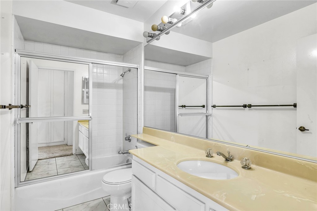 72355 Roxbury Drive Rancho Mirage, CA 92270 - Photo 47 of 61 a bathroom with a granite countertop sink toilet and shower