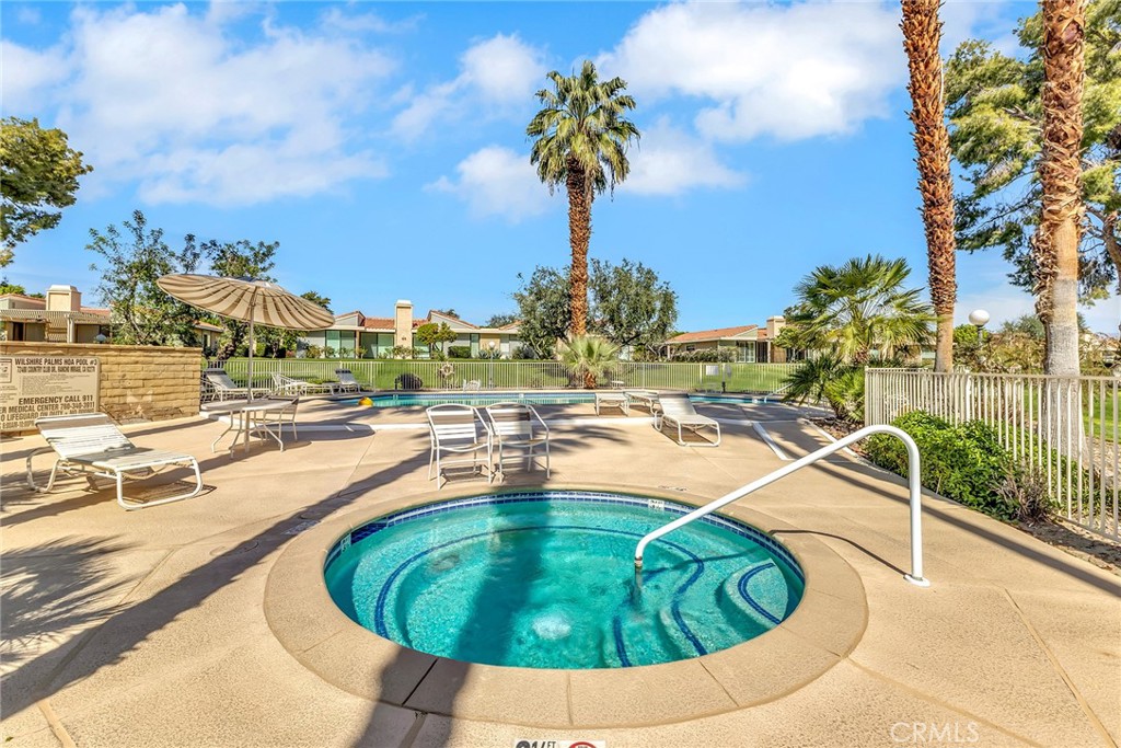 72355 Roxbury Drive Rancho Mirage, CA 92270 - Photo 55 of 61 swimming pool view with a garden space