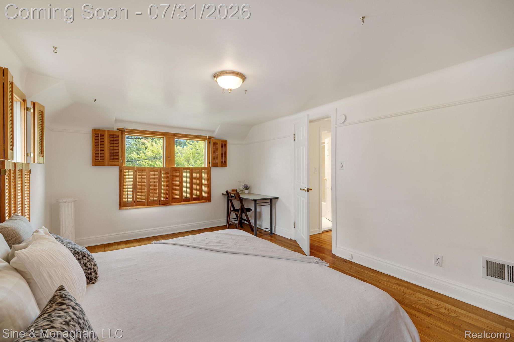 417 Cloverly Road Grosse Pointe, MI 48236 - Photo 34 of 70 Hardwood flooring complementing white walls and trim
