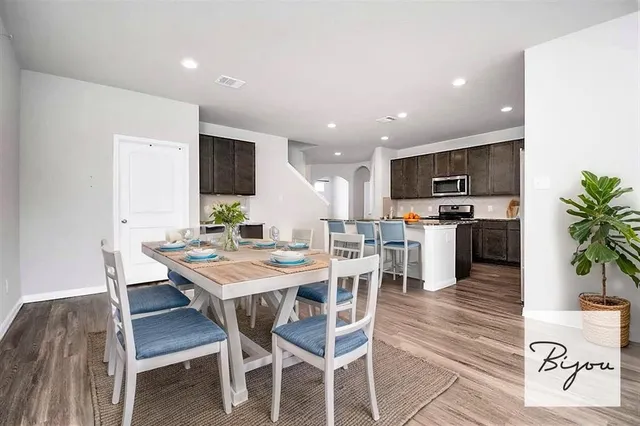 a view of a dining room with furniture