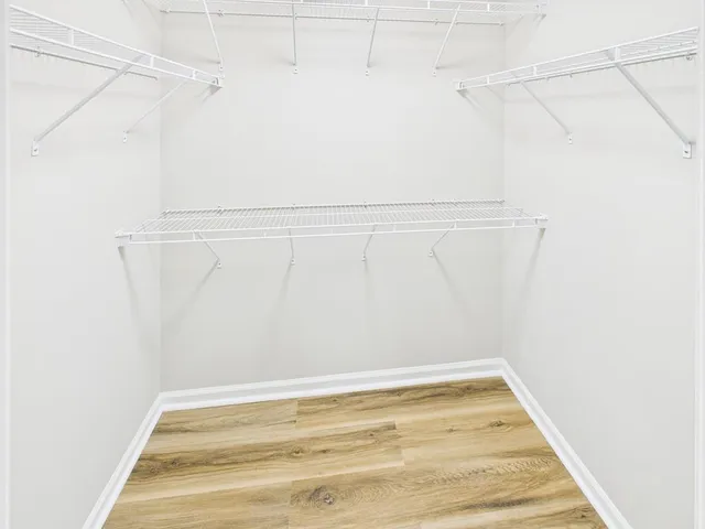 a view of a room with racks on the wall