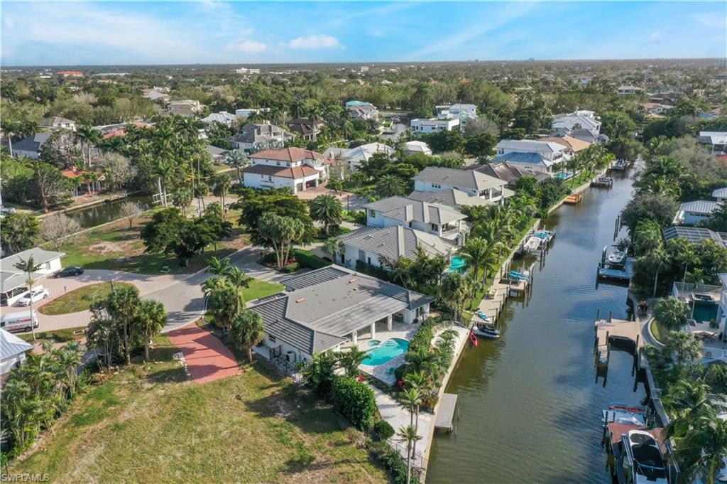 5215 Seashell Avenue Naples, FL 34103 - Photo 41 of 47 an aerial view of multiple house