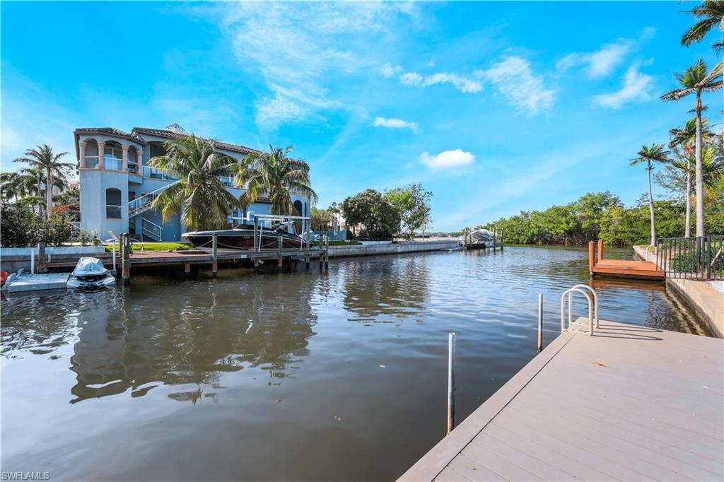 5215 Seashell Avenue Naples, FL 34103 - Photo 42 of 47 a view of a lake with boats