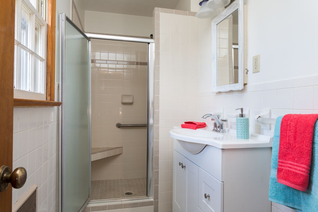 311 Varner Road Churchville, VA 24421 - Photo 12 of 29 a bathroom with a sink vanity mirror and shower