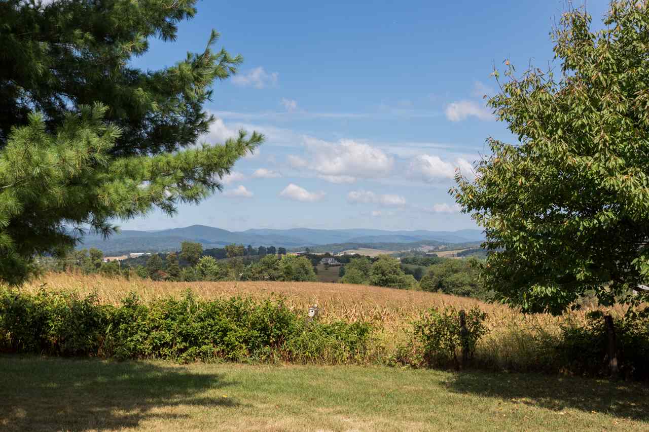 311 Varner Road Churchville, VA 24421 - Photo 28 of 29 a view of a lake with houses in the back