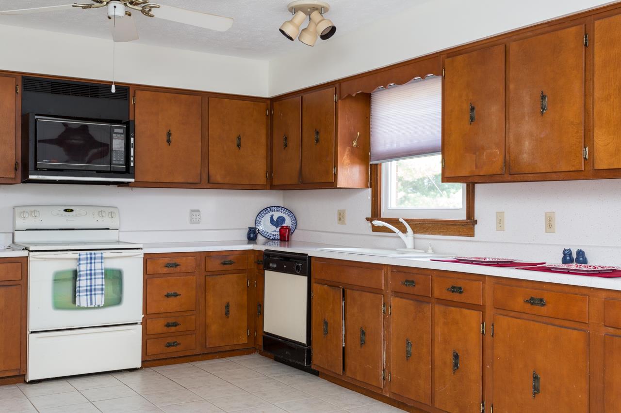 311 Varner Road Churchville, VA 24421 - Photo 6 of 29 a kitchen with cabinets appliances and a sink