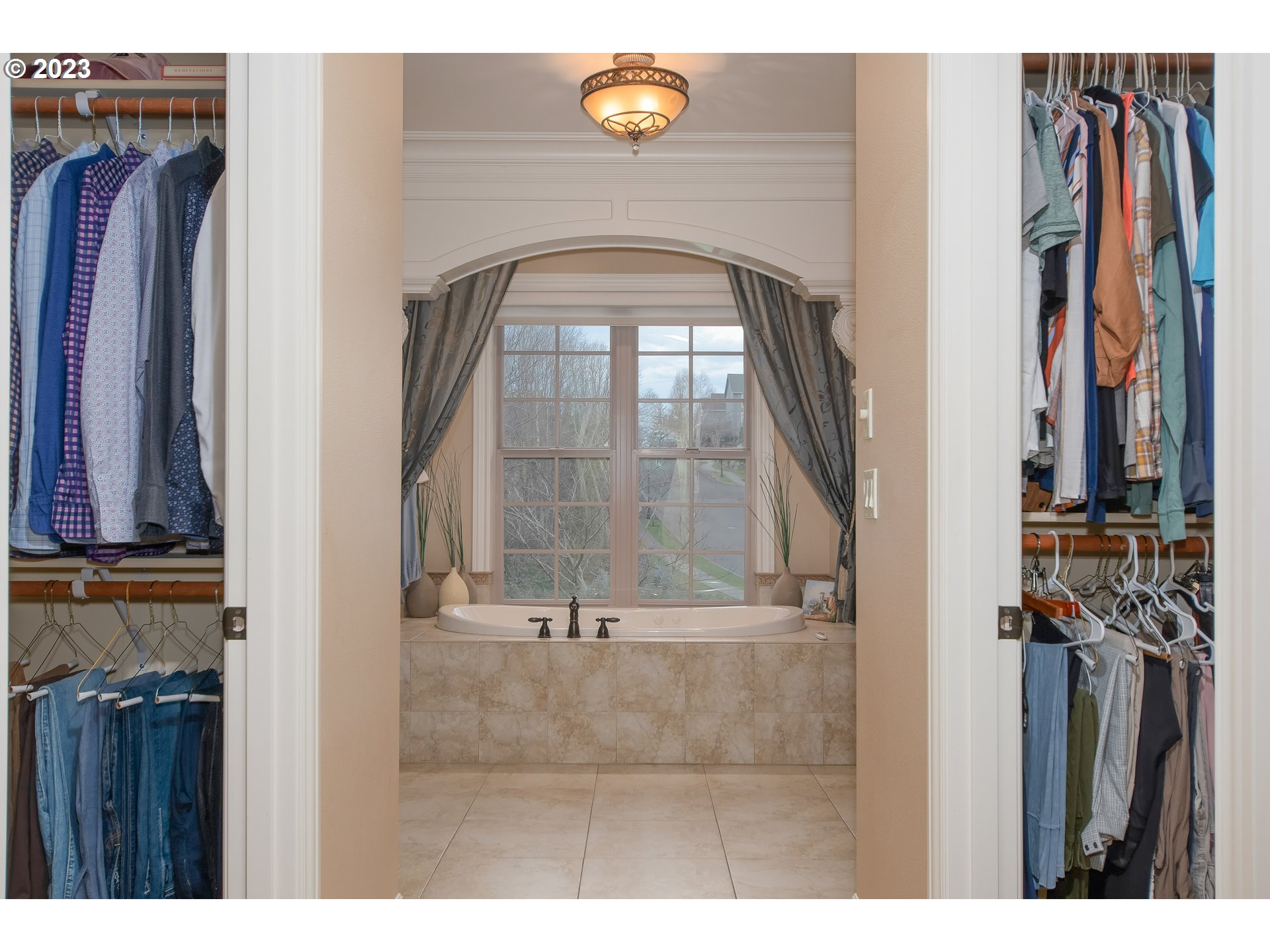 1601 South 8th Way Ridgefield, WA 98642 - Photo 13 of 32 a view of walk in closet with clothes and shoes