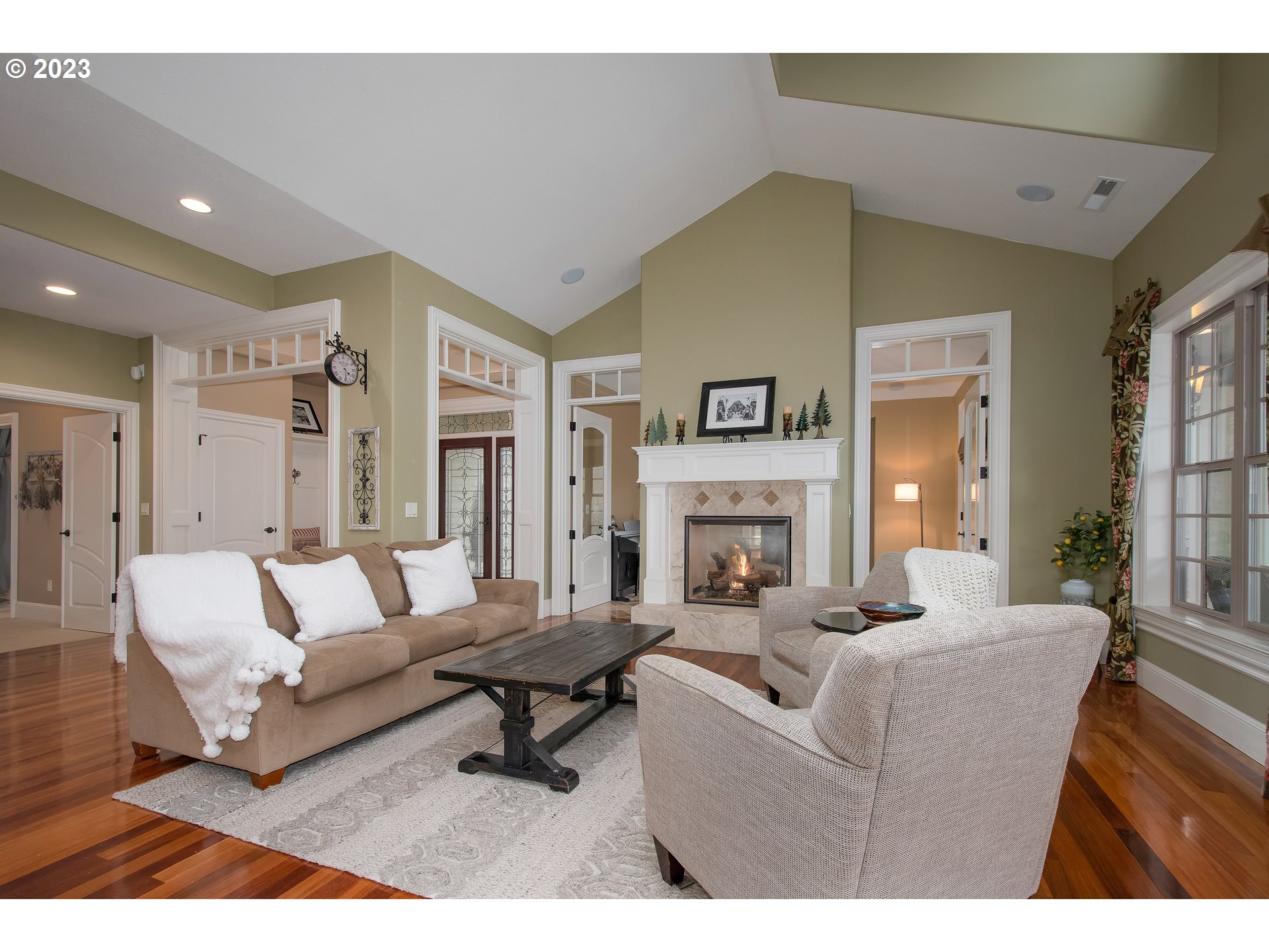 1601 South 8th Way Ridgefield, WA 98642 - Photo 5 of 32 a living room with furniture and a fireplace