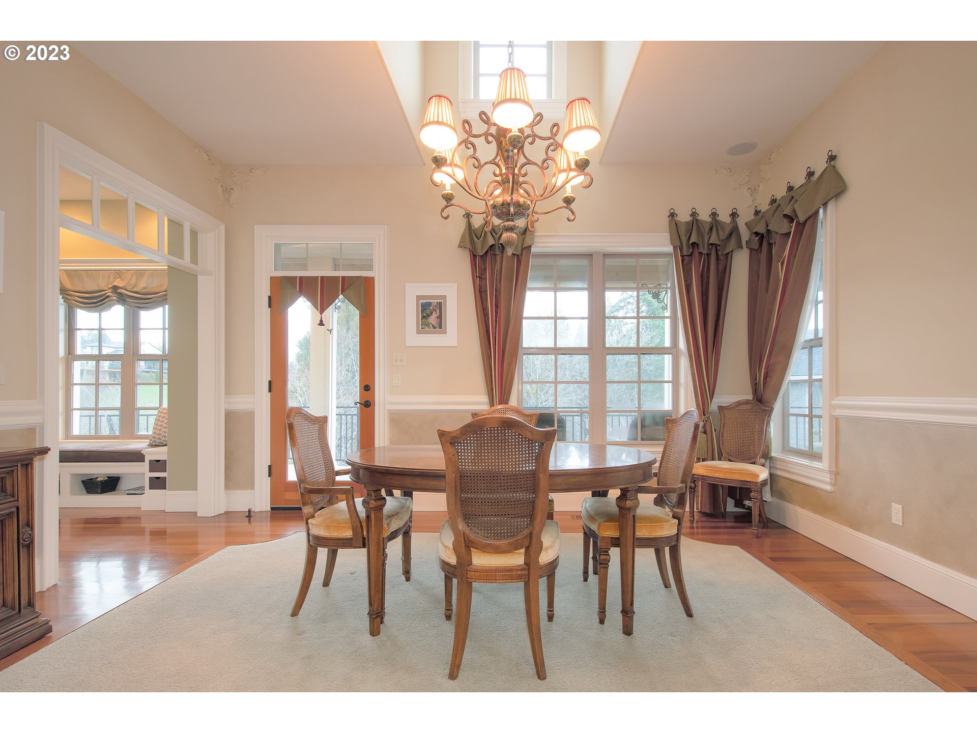 1601 South 8th Way Ridgefield, WA 98642 - Photo 7 of 32 a view of a dining room with furniture and wooden floor