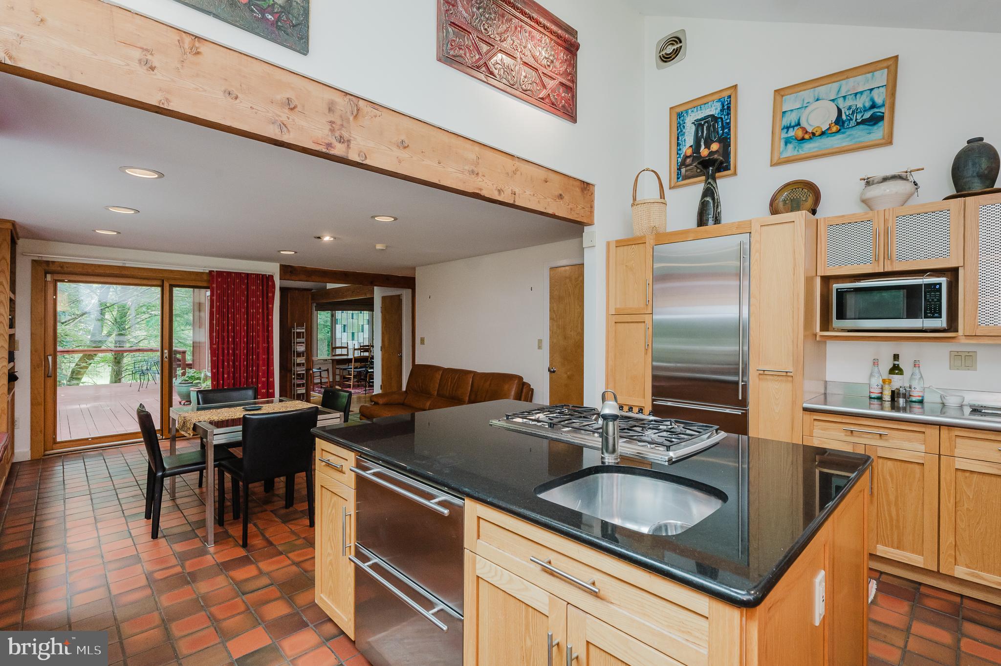 6010 Fork Woods Road Baldwin, MD 21013 - Photo 18 of 65 Kitchen island has sink and under counter fridge