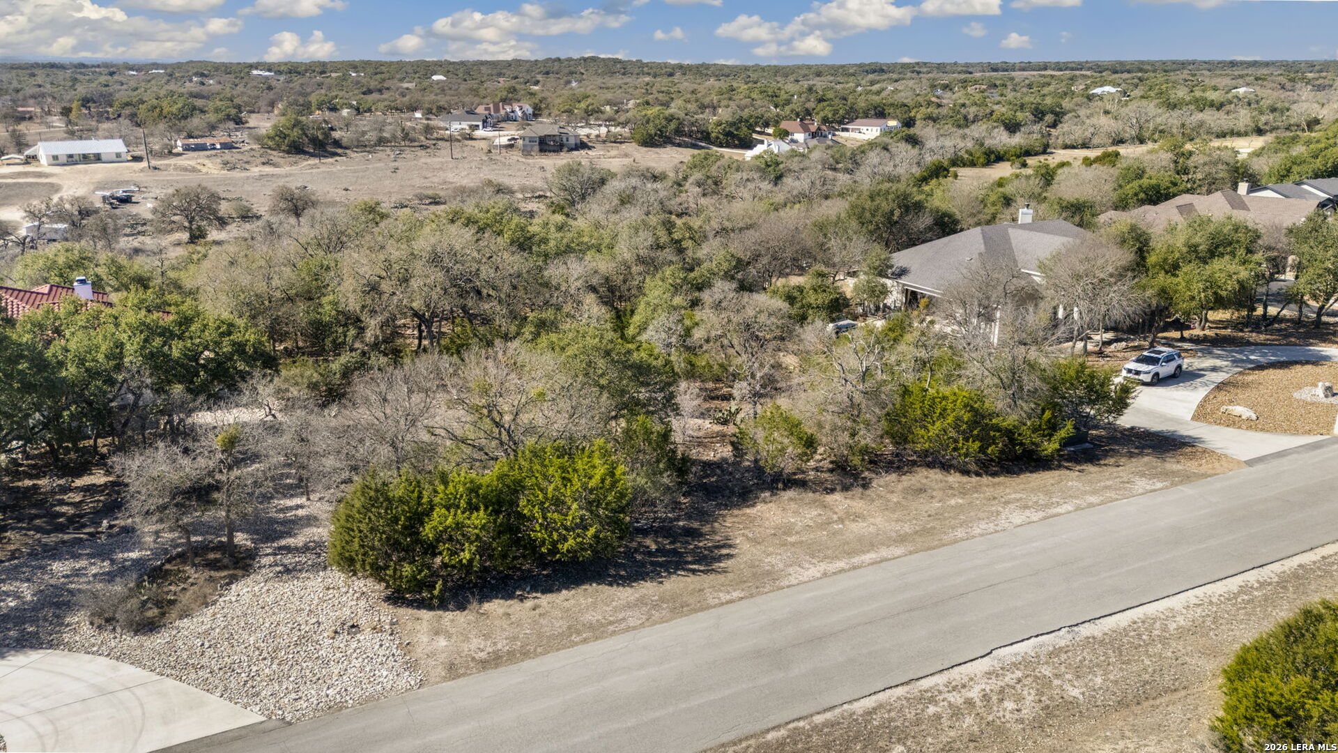 335 Rittimann Road Spring Branch, TX 78070 - Photo 21 of 31 an aerial view of a house with a yard