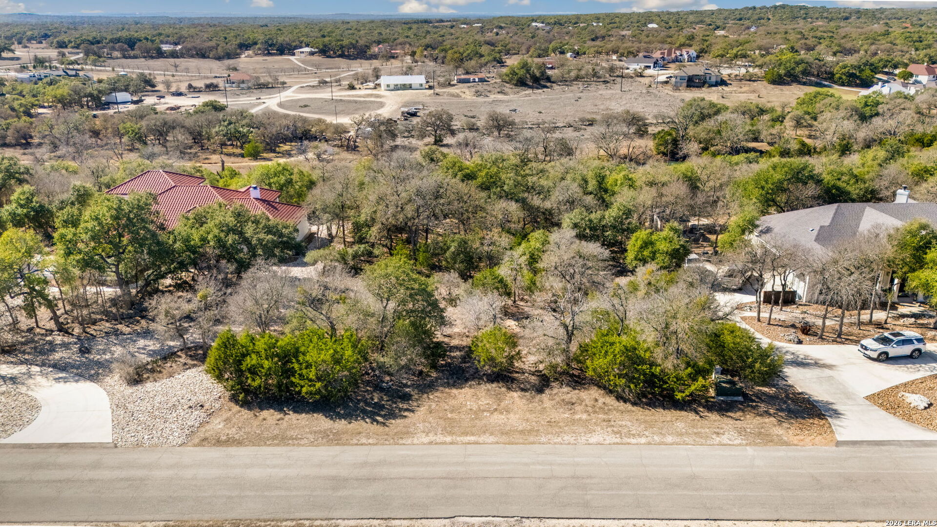 335 Rittimann Road Spring Branch, TX 78070 - Photo 4 of 31 an aerial view of residential houses with outdoor space