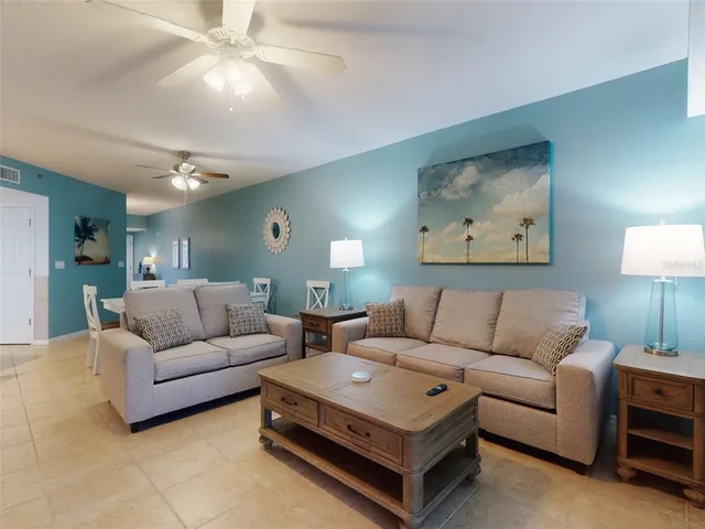 a kitchen with cabinets and stainless steel appliances