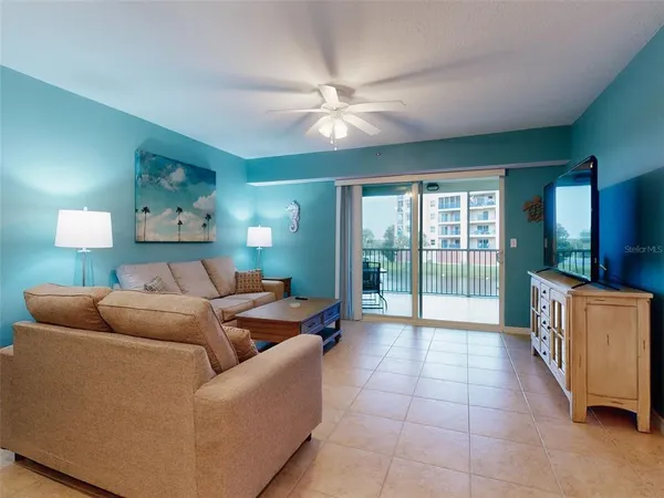 a kitchen with stainless steel appliances a refrigerator sink and microwave