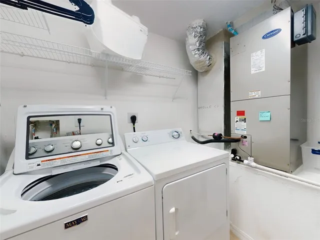a bathroom with a bathtub and a sink