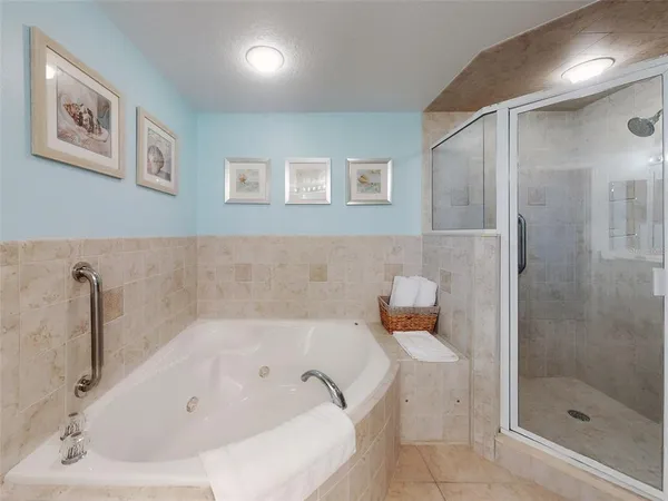 a view of a porch with furniture and a yard