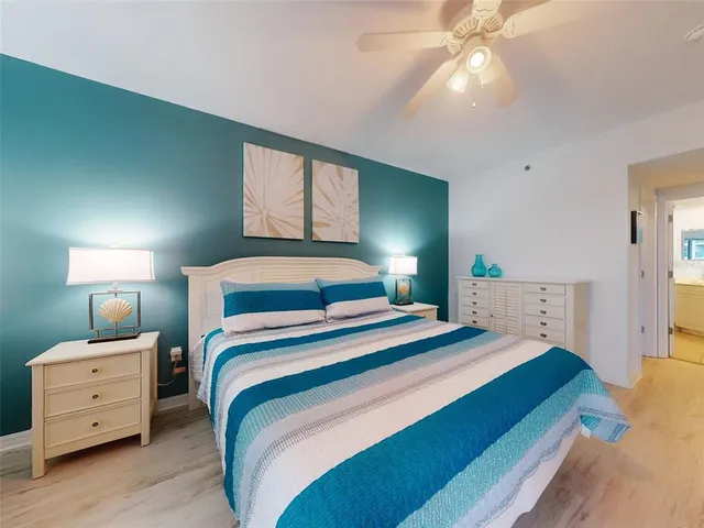 a front view of house with a garden