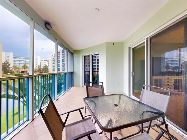 a living room with fireplace furniture and a flat screen tv