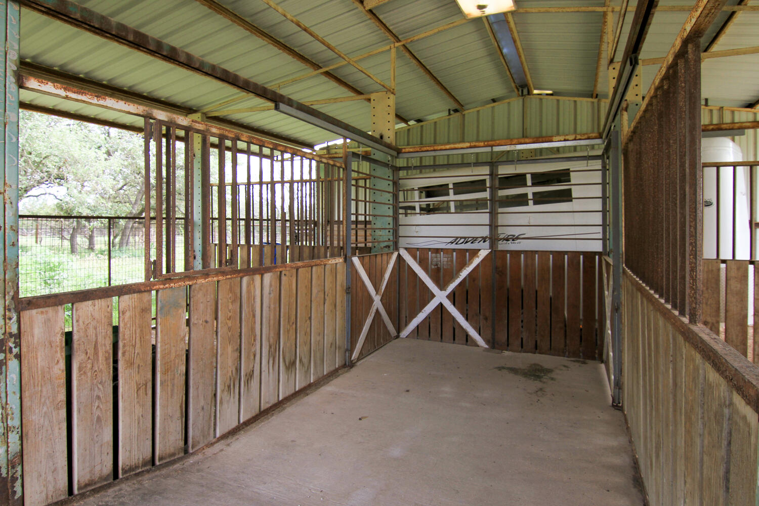 219 Young Ranch Road Georgetown, TX 78633 - Photo 36 of 40 Four large stalls with storage