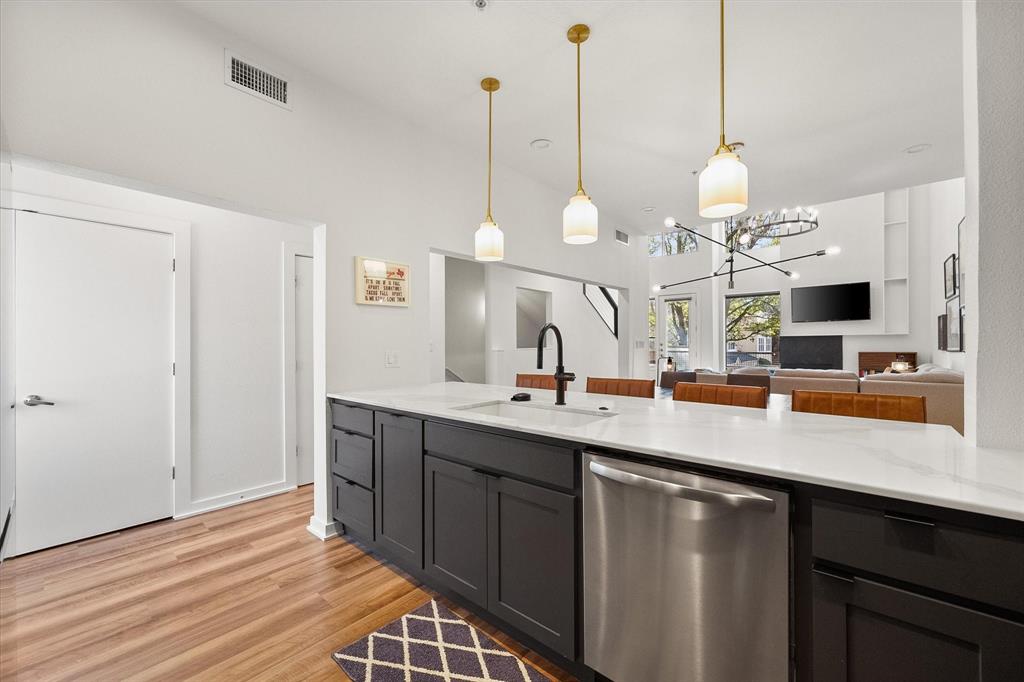 6907 Sumner Street The Colony, TX 75056 - Photo 18 of 35 Large breakfast bar for additional seating