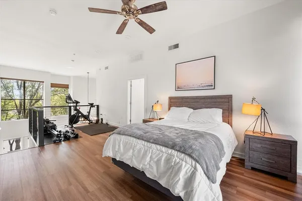 a bedroom with a bed and a view of bedroom