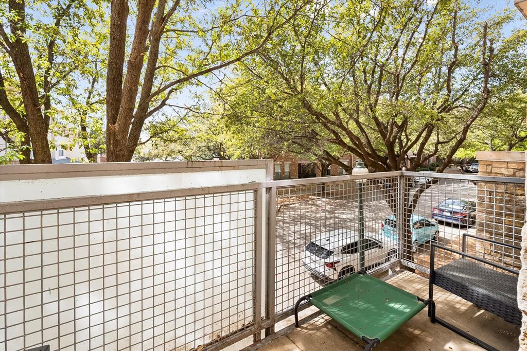 6907 Sumner Street The Colony, TX 75056 - Photo 28 of 35 This serene balcony is off of the primary bedroom.