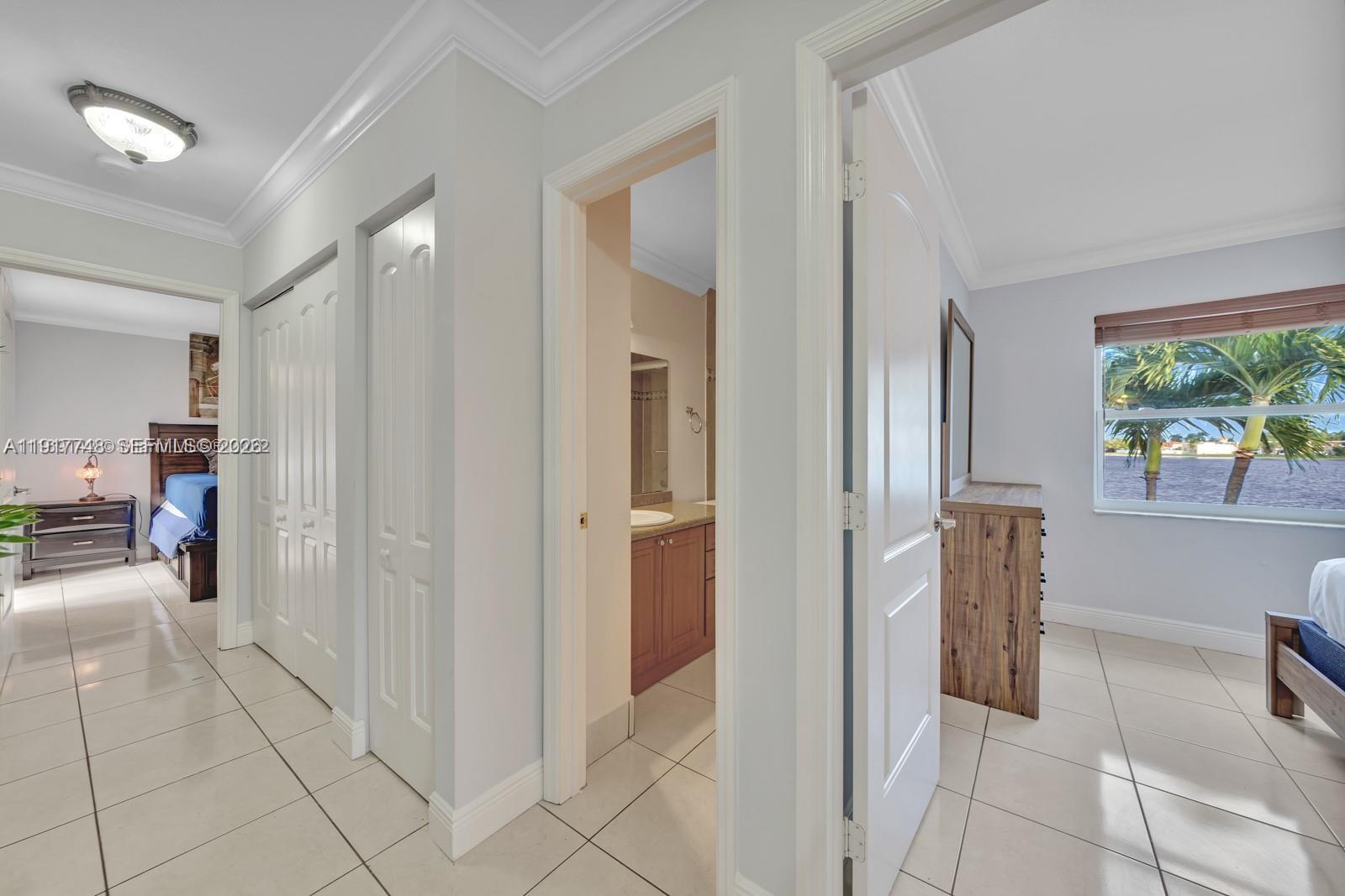 815 Northwest 126th Court Miami, FL 33182 - Photo 17 of 20 a view of livingroom with furniture and window