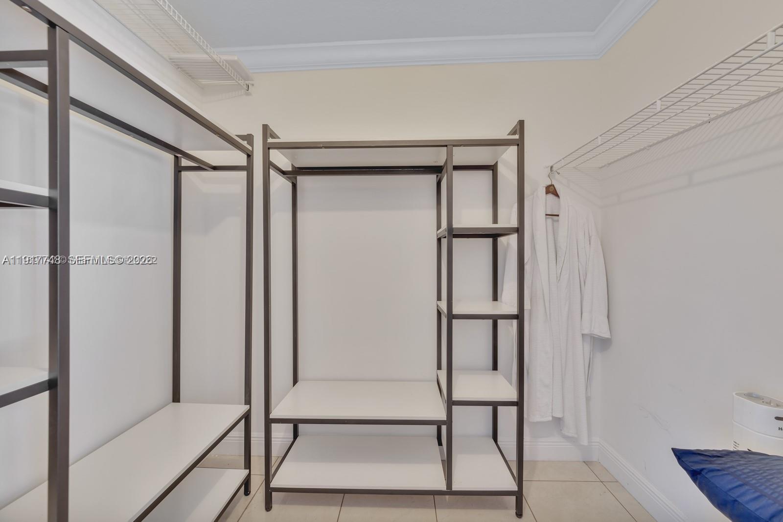 815 Northwest 126th Court Miami, FL 33182 - Photo 19 of 20 a bathroom with a shower and a glass door