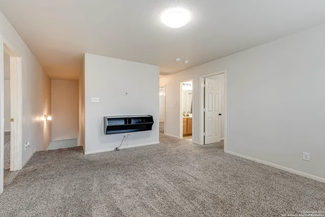 a view of a livingroom with a staircase
