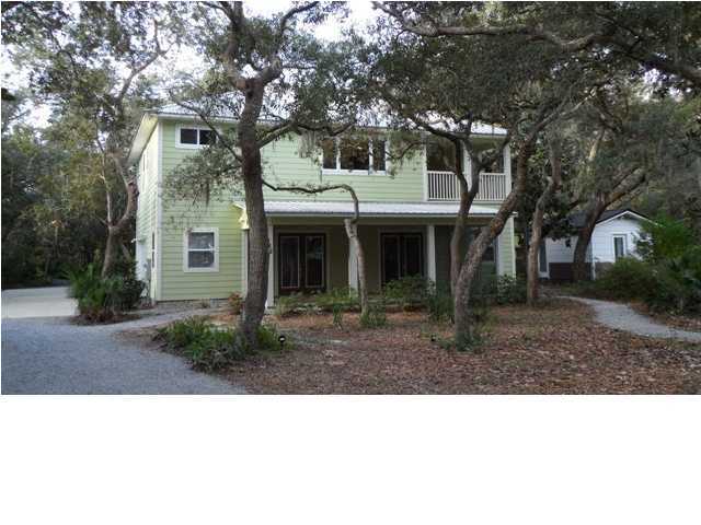 a black and white photo of a house