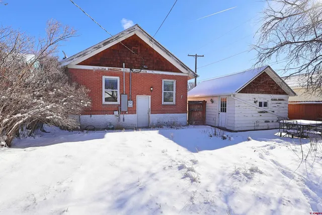 a front view of house with a yard