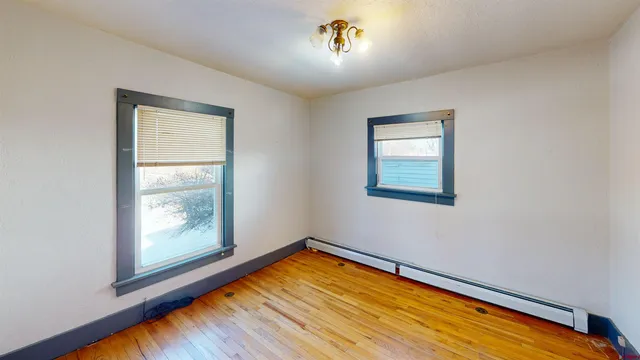 a view of a room with a large window