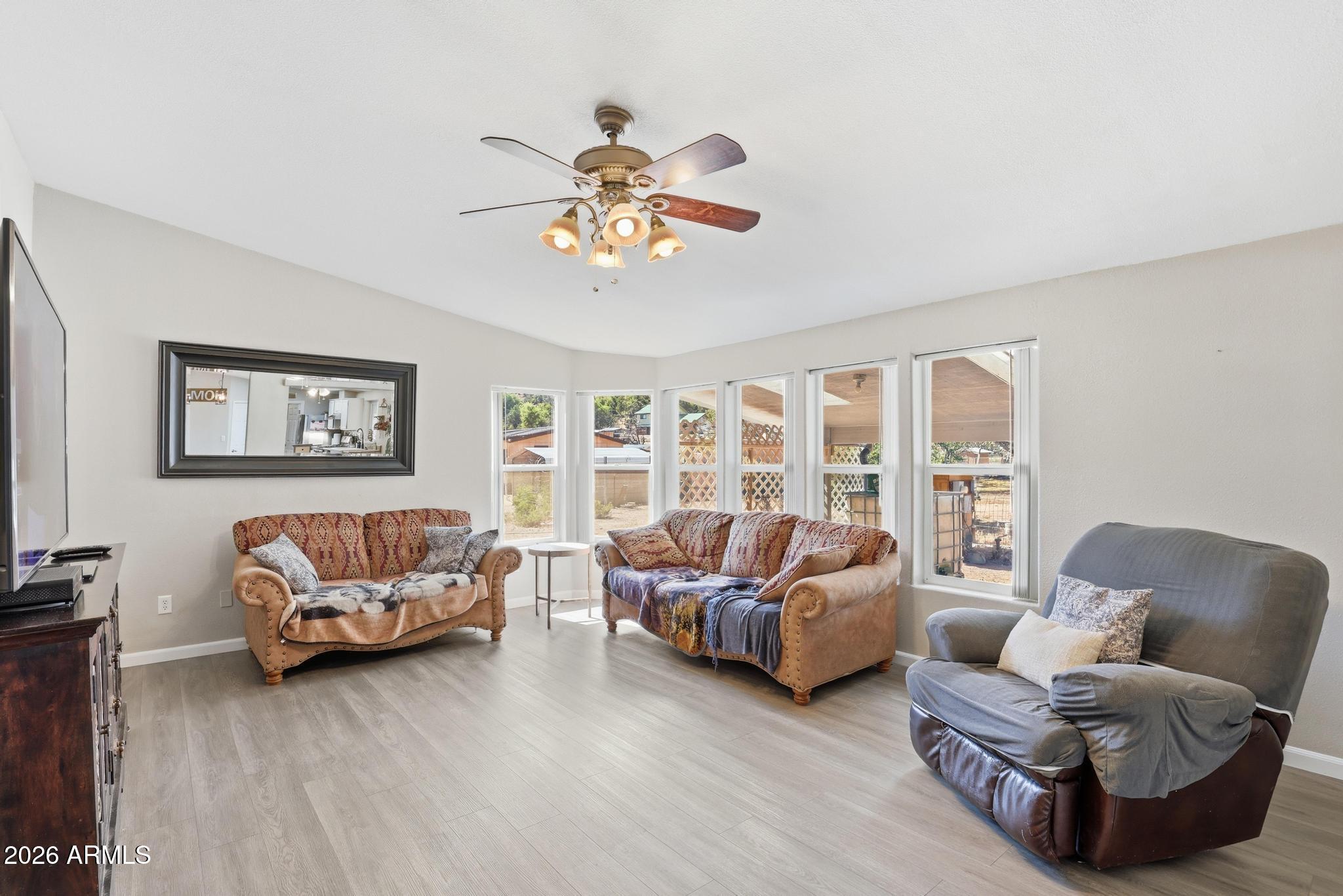 191 Cornerstone Way Payson, AZ 85541 - Photo 13 of 37 a living room with furniture and a large window