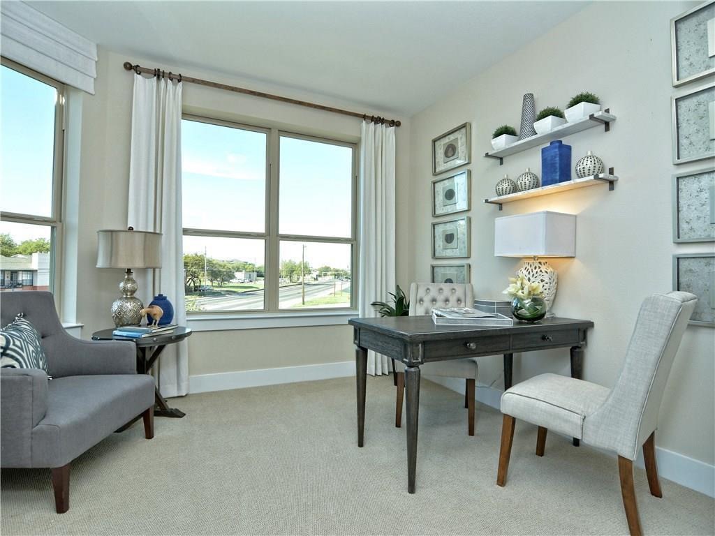 12504 Red Sparrow Street, Unit 1 Austin, TX 78729 - Photo 7 of 22 a living room with furniture and a window