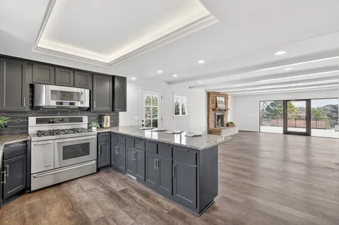 an aerial view of residential house with outdoor space