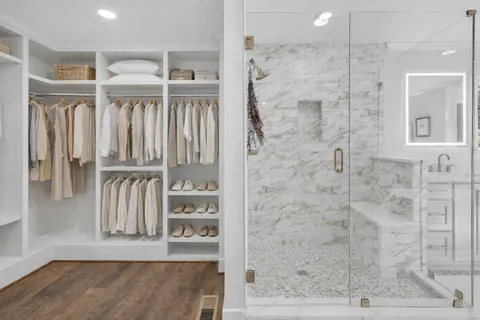 a view of a swimming pool with a lounge chairs