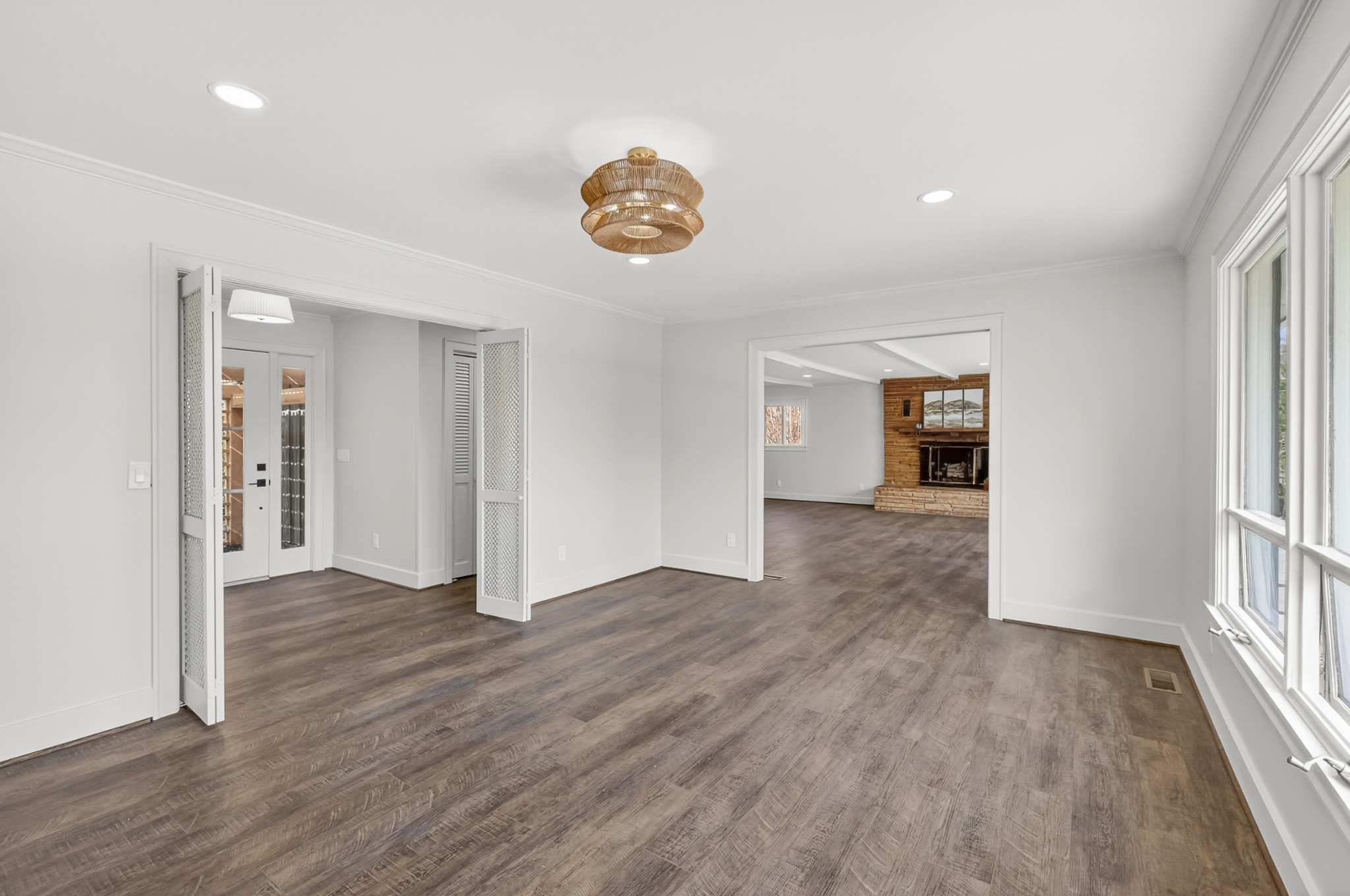 91 Country Club Terrace Winchester, TN 37398 - Photo 9 of 74 an empty room with wooden floor and windows