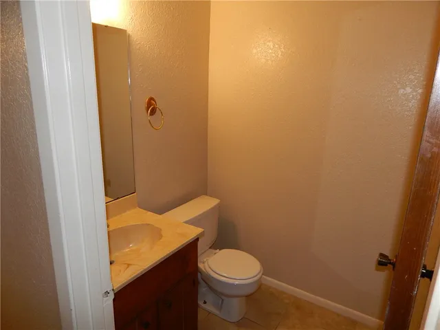 a bathroom with a sink and toilet