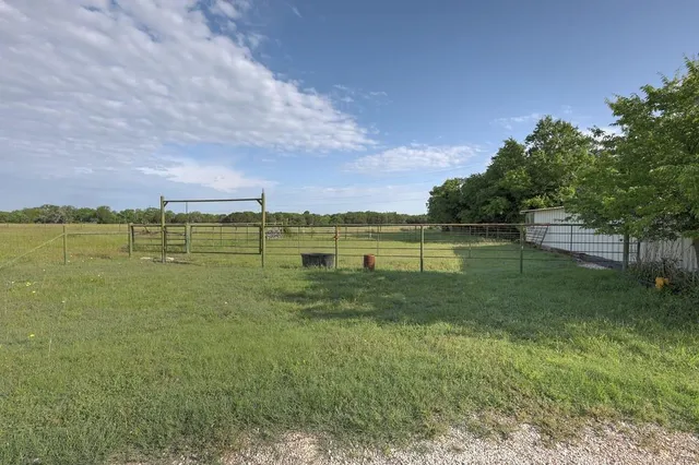 a view of a kitchen with sink and dishwasher