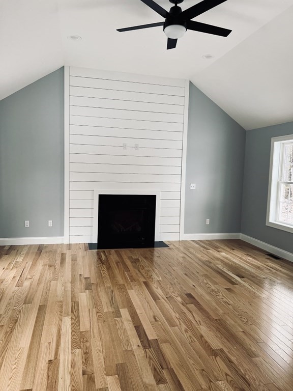 150 French Road, Unit LOT 4 Templeton, MA 01468 - Photo 14 of 28 a view of empty room with wooden floor and fireplace