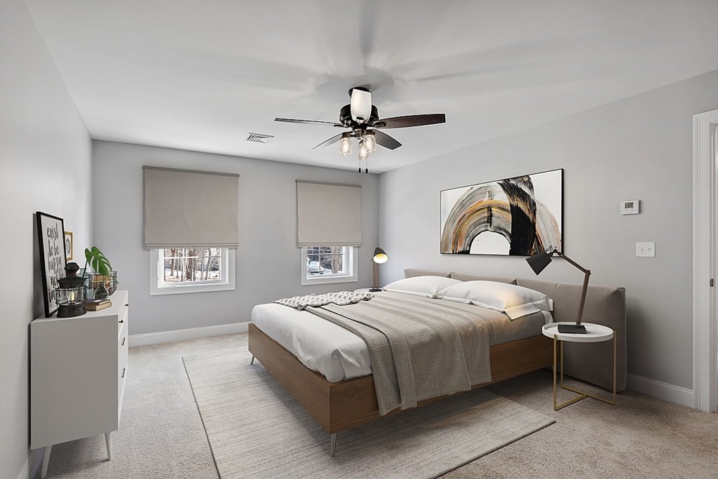 150 French Road, Unit LOT 4 Templeton, MA 01468 - Photo 23 of 28 a bedroom with a bed and a chandelier
